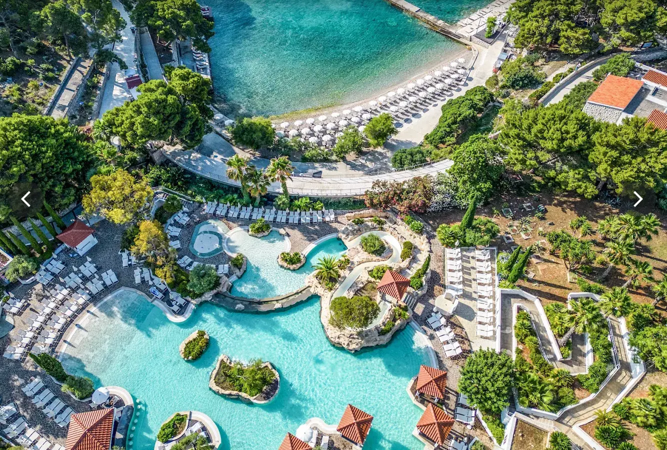 Aerial view of the lagoon pool complex and the beach beyond