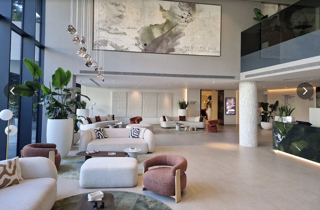 Bright modern lobby lounge at Hotel Sumratin