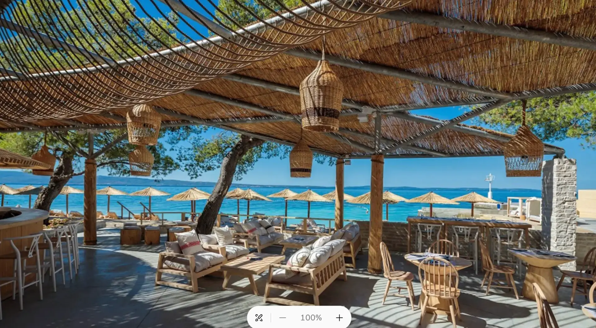 Shaded beach club lounge by the sea